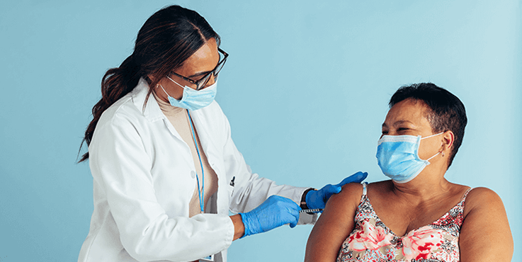 Woman getting a covid-19 vaccine